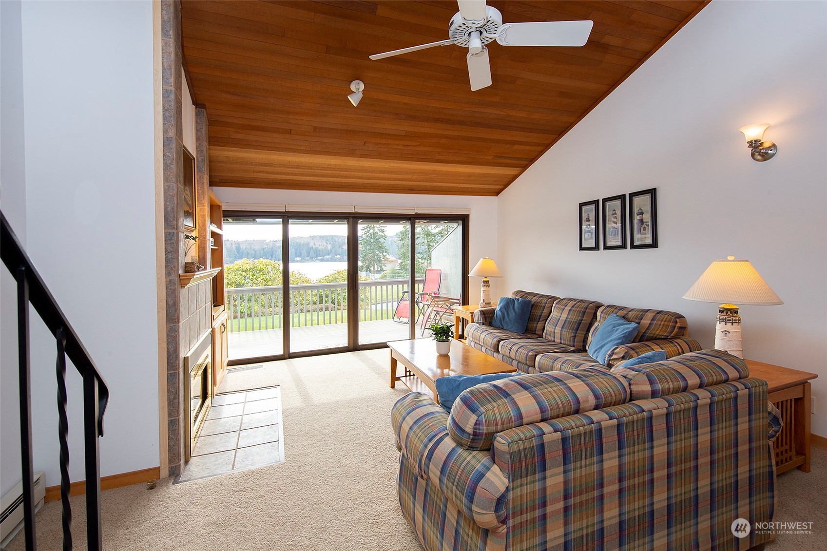 40 Olympic Way, Unit 9 Port Ludlow, WA 98365 - Photo 3 of 35 a bedroom with a bed and a lamp next to a window