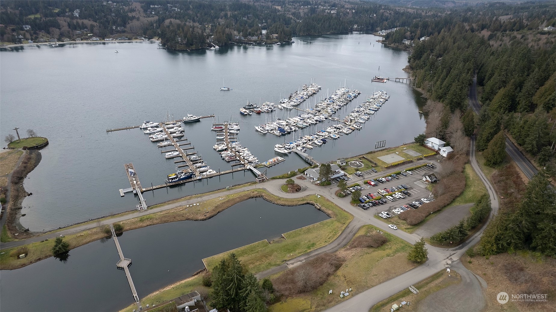 40 Olympic Way, Unit 9 Port Ludlow, WA 98365 - Photo 31 of 35 an aerial view of a house with a lake view