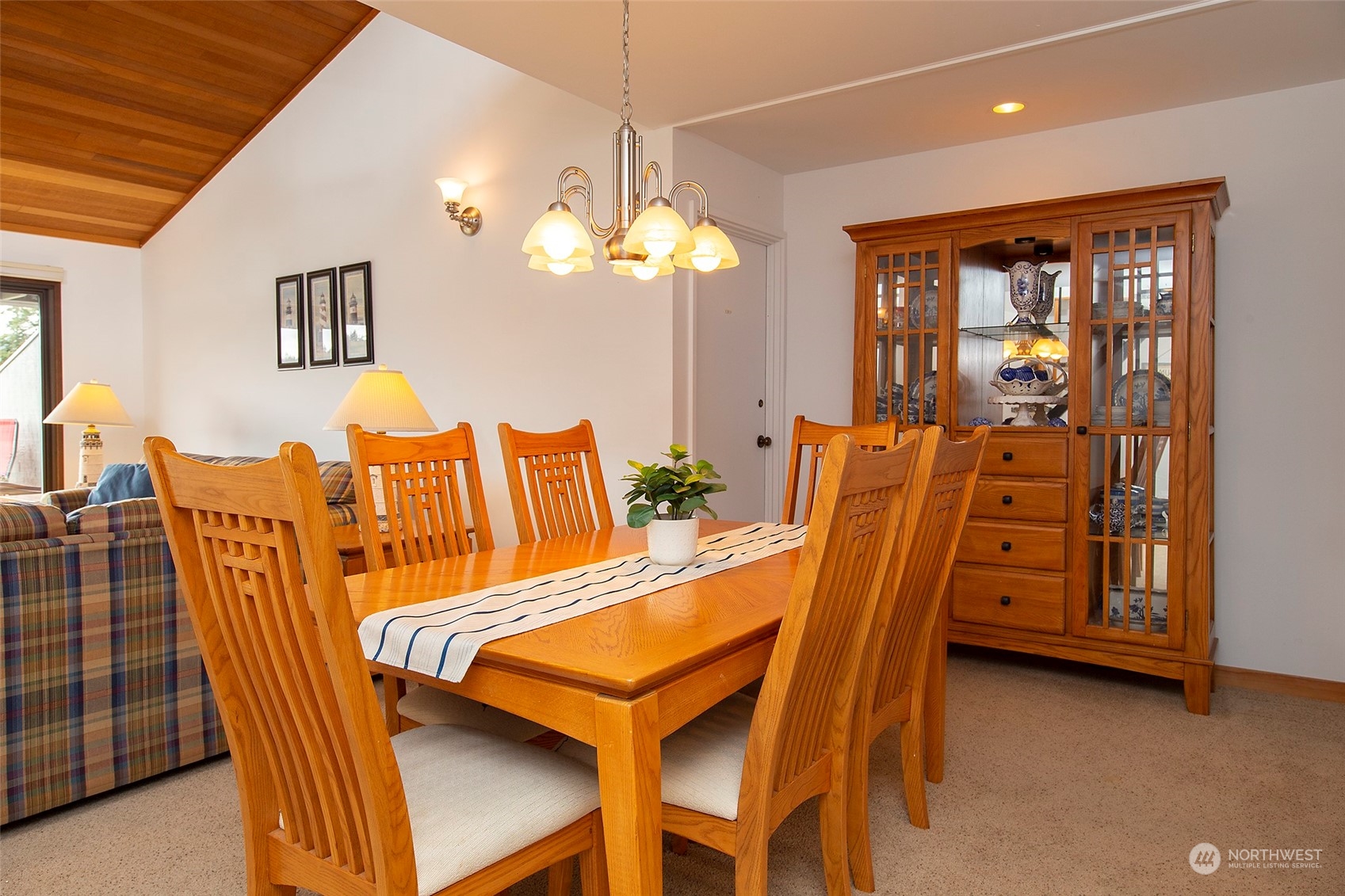 40 Olympic Way, Unit 9 Port Ludlow, WA 98365 - Photo 6 of 35 a dining room with furniture and chandelier kitchen view