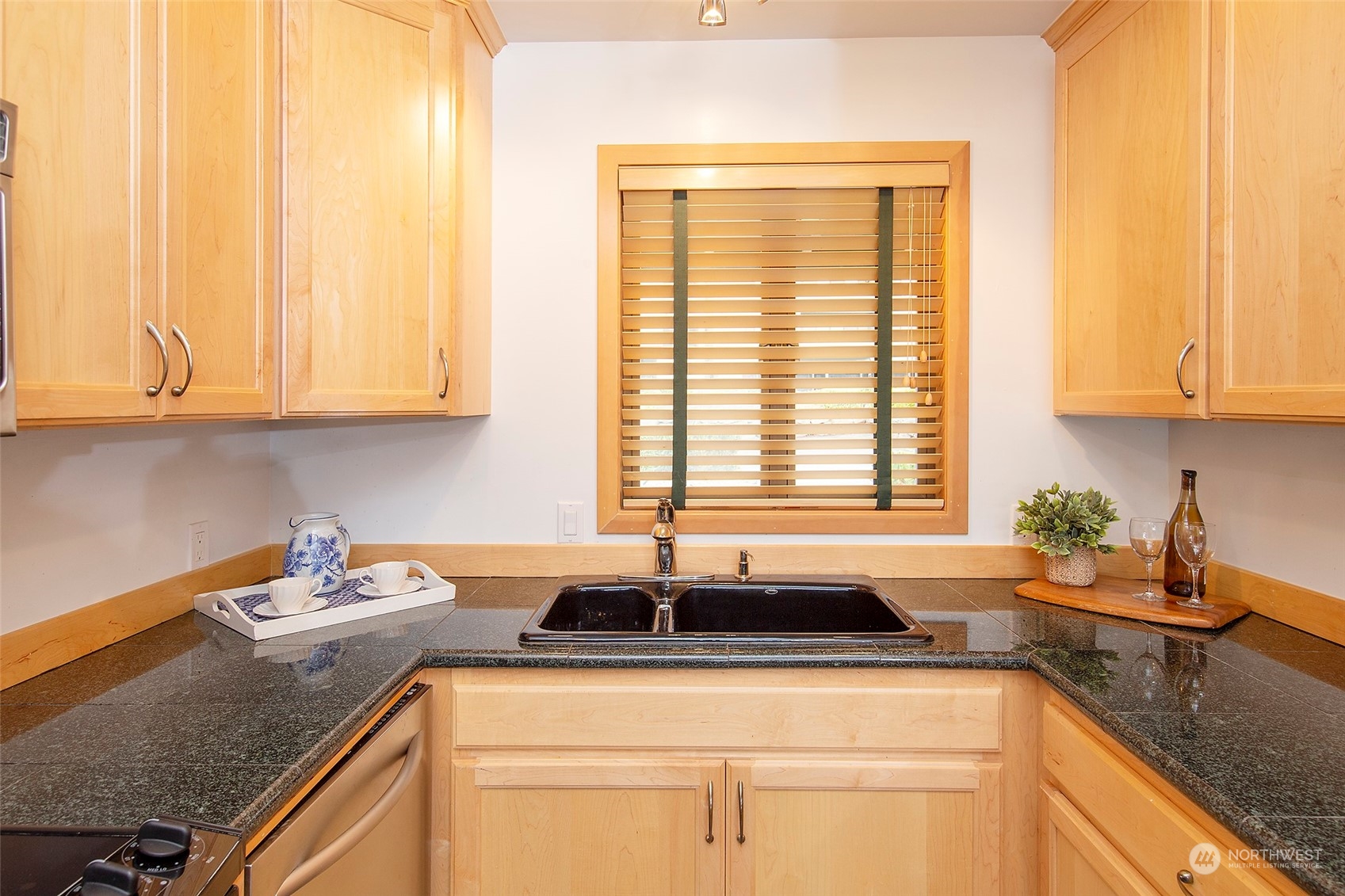 40 Olympic Way, Unit 9 Port Ludlow, WA 98365 - Photo 9 of 35 a kitchen with stainless steel appliances granite countertop a sink stove and cabinets