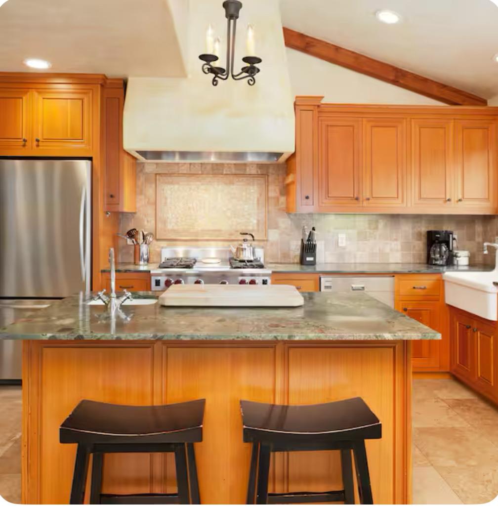759 Rockaway Beach Avenue Pacifica, CA 94044 - Photo 2 of 20 a kitchen with stainless steel appliances granite countertop a sink counter space and a window