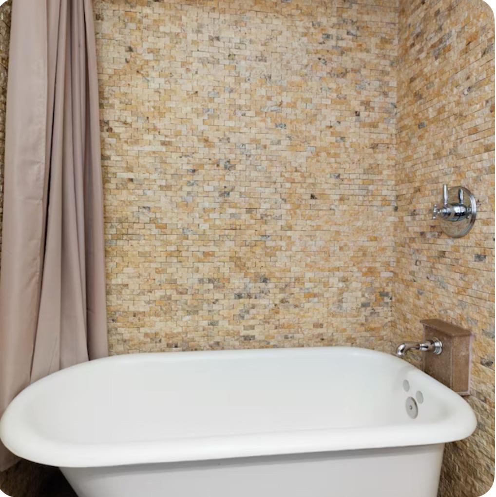 759 Rockaway Beach Avenue Pacifica, CA 94044 - Photo 8 of 20 a bathroom with a bathtub