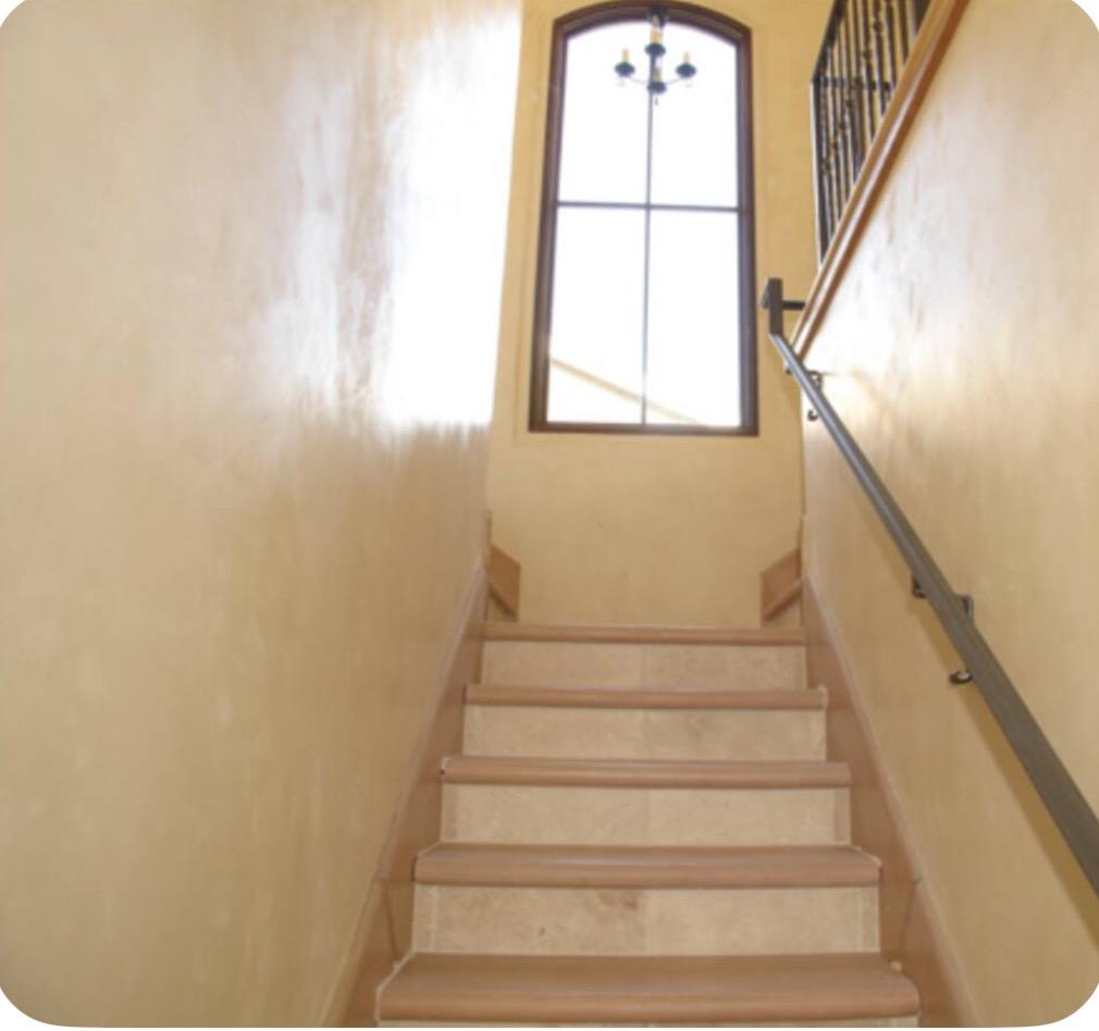759 Rockaway Beach Avenue Pacifica, CA 94044 - Photo 10 of 20 a view of staircase with white walls and a window