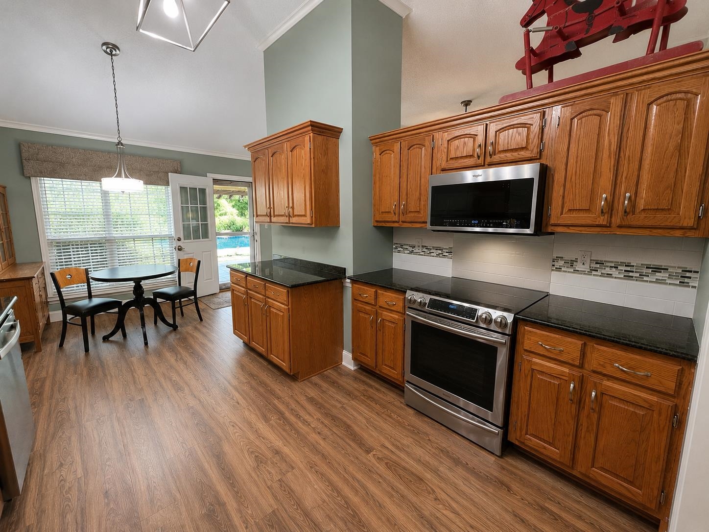 1946 Little John Road Millington, TN 38053 - Photo 7 of 20 Kitchen and dining area featuring wood-finish flooring