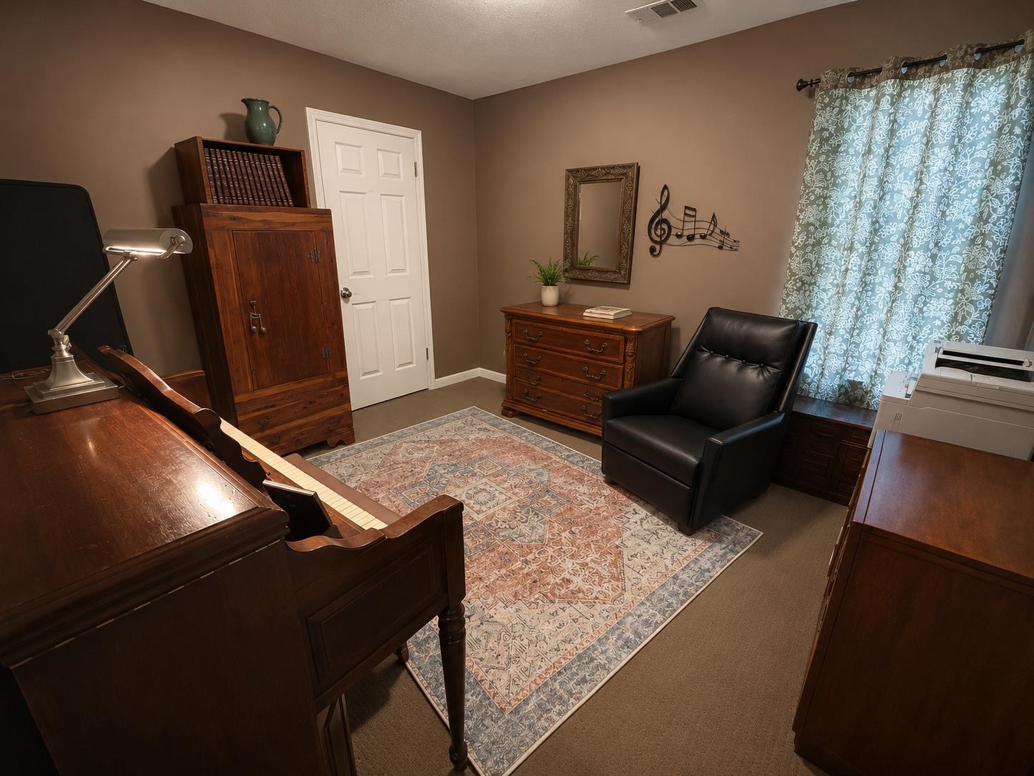 1946 Little John Road Millington, TN 38053 - Photo 10 of 20 Interior room featuring neutral wall color, carpet flooring, a white paneled door, and a window with patterned drapes