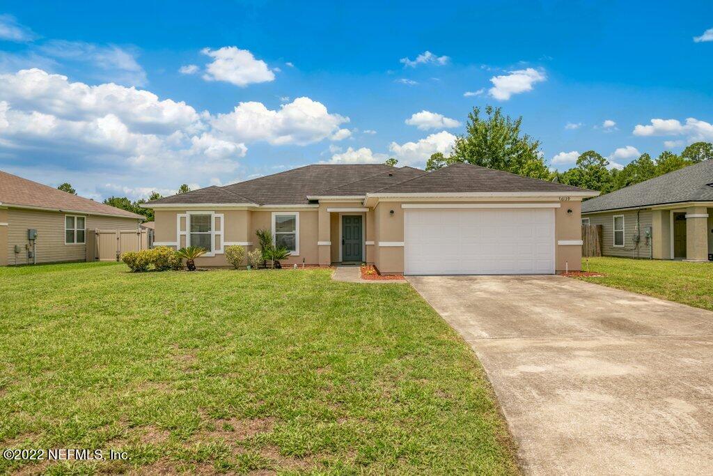 76129 Long Pond Loop Yulee, FL 32097 - Photo 2 of 36 Front Yard