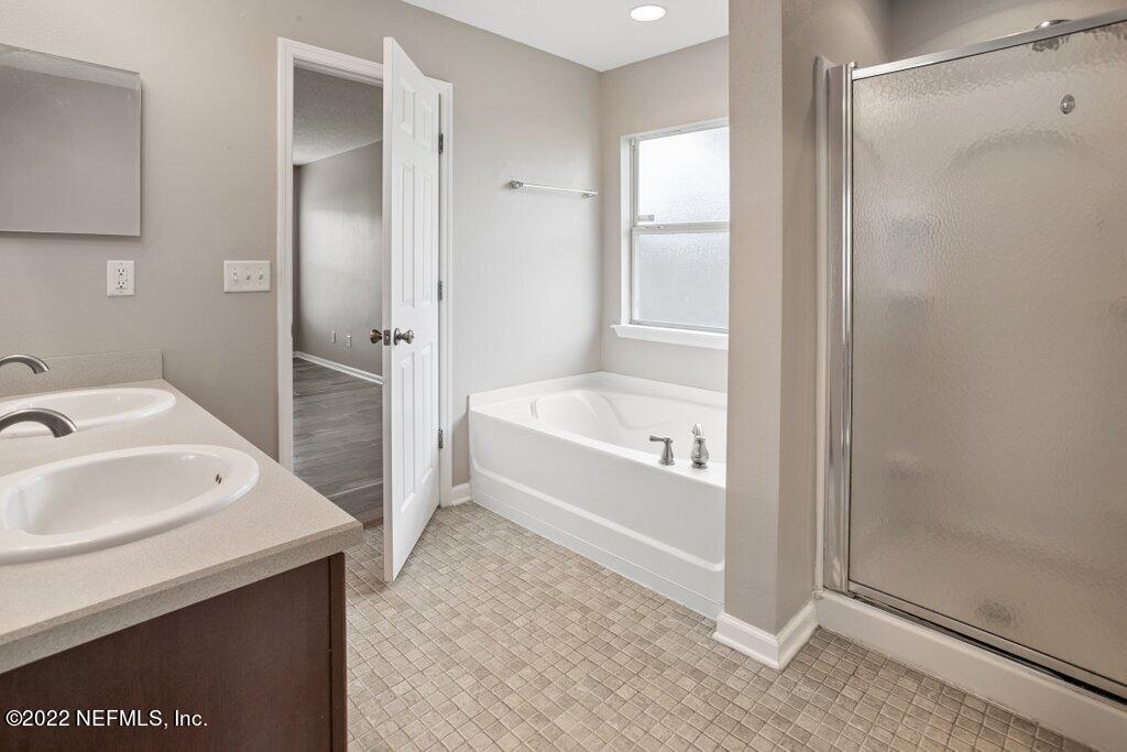 76129 Long Pond Loop Yulee, FL 32097 - Photo 22 of 36 Master Bathroom View 2
