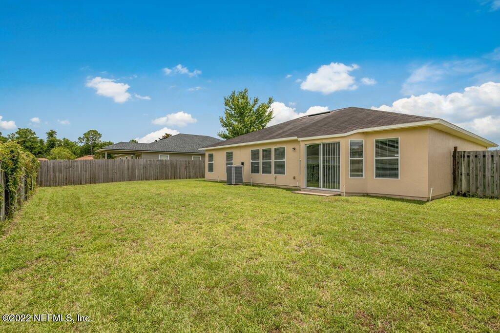 76129 Long Pond Loop Yulee, FL 32097 - Photo 36 of 36 Backyard View 2