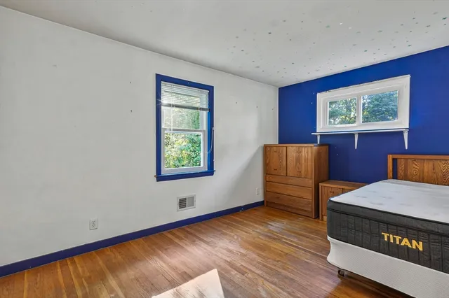 a living room with furniture and a gate