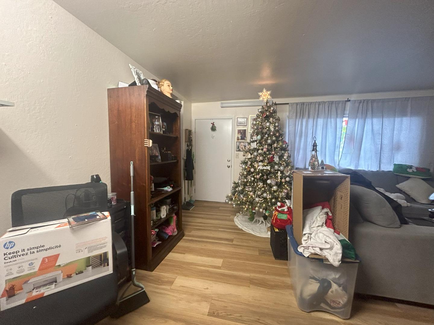 20 Marian Court San Rafael, CA 94901 - Photo 9 of 9 a living room with furniture and a bookshelf