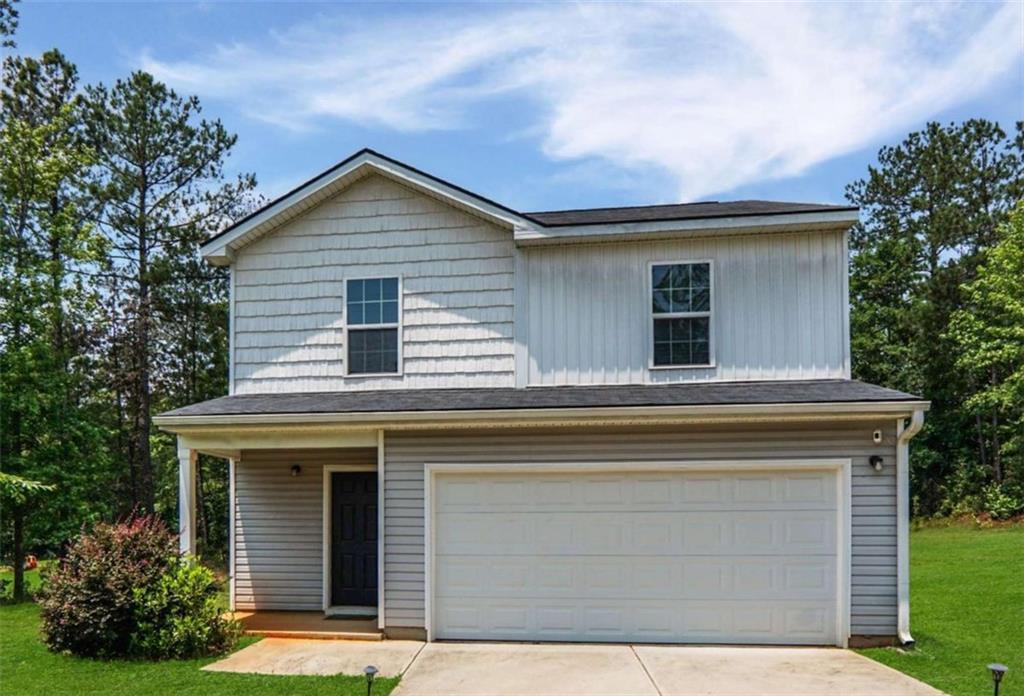 a house view with a outdoor space