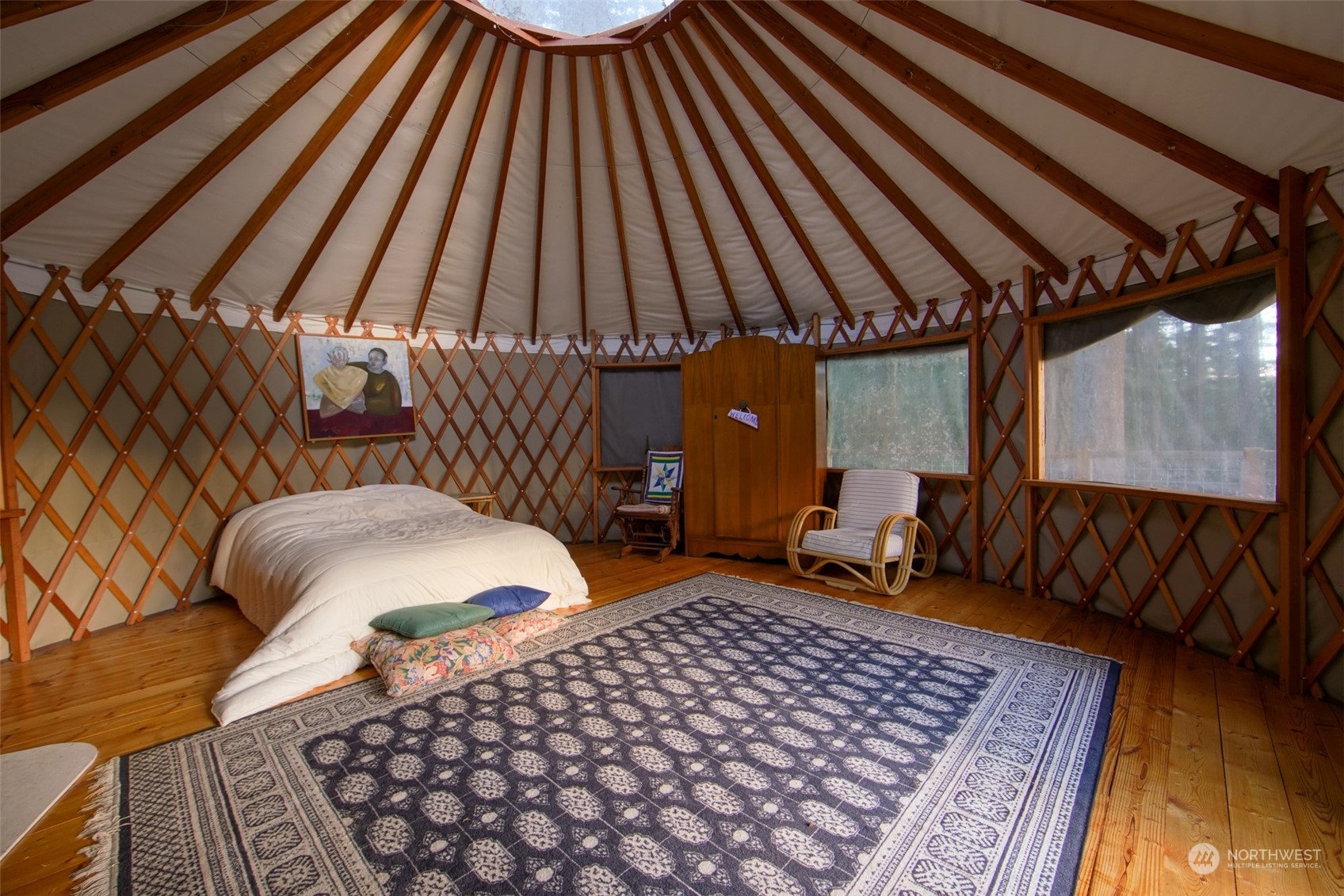 549 White Beach Road Orcas Island, WA 98280 - Photo 33 of 38 a bedroom with furniture and a rug