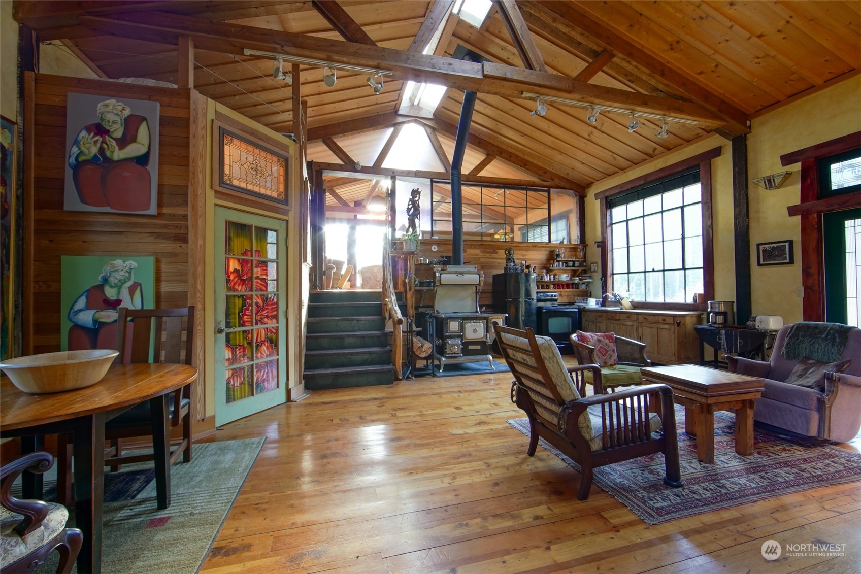 549 White Beach Road Orcas Island, WA 98280 - Photo 5 of 38 a living room filled with furniture and a large window