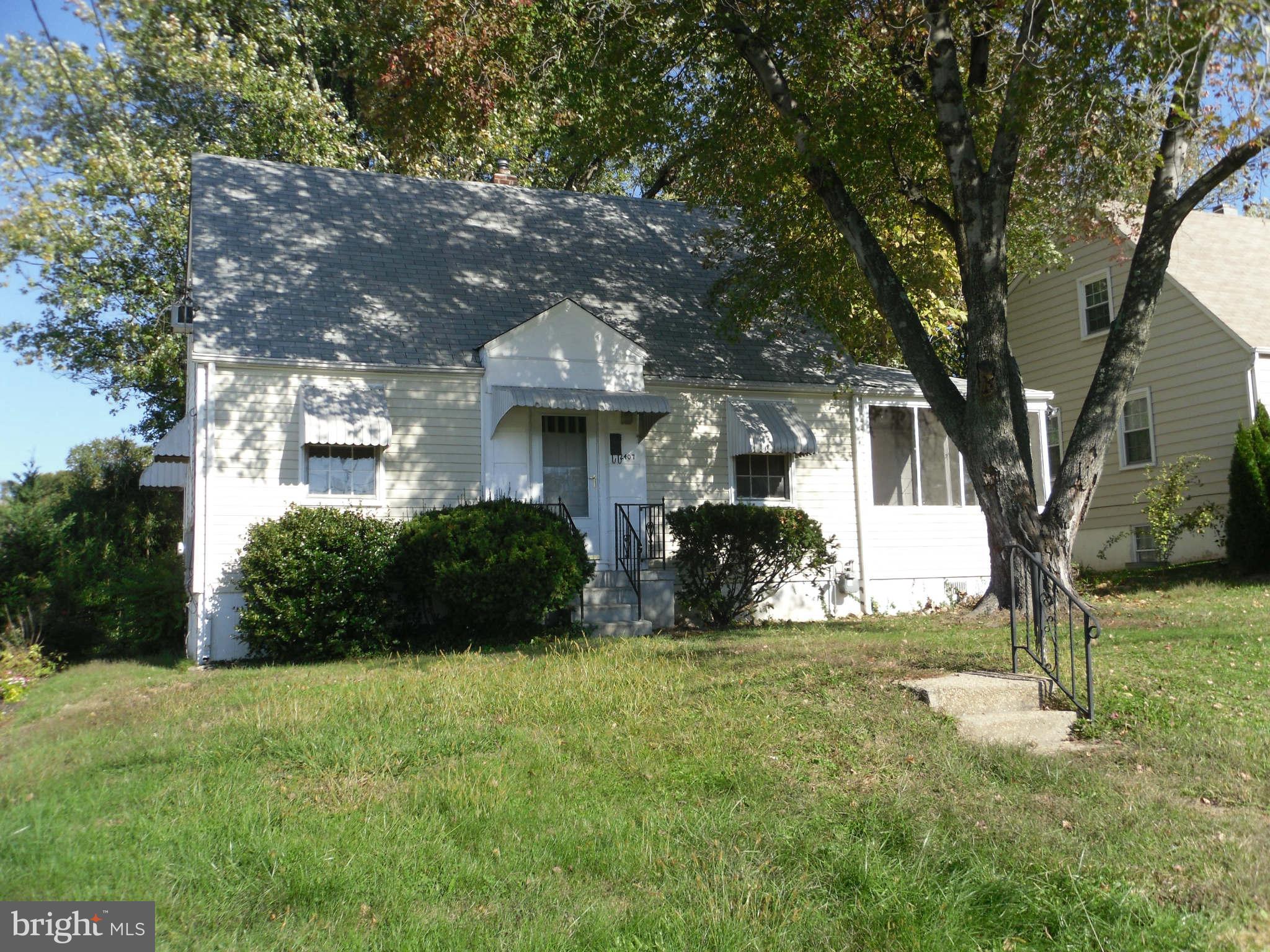 2407 Randolph Road Silver Spring, MD 20906 - Photo 1 of 6 a view of a house with a yard