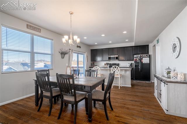 8302 Watchmen Road Fountain, CO 80817 - Photo 7 of 34 Dining into the gorgeous kitchen
