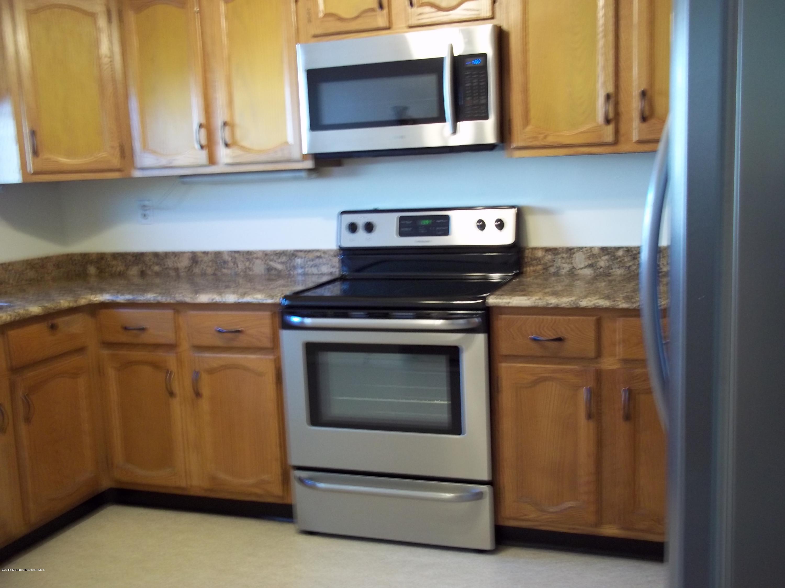 13 Ashley Road Manchester Township, NJ 08759 - Photo 12 of 25 8-Stove & Microwave