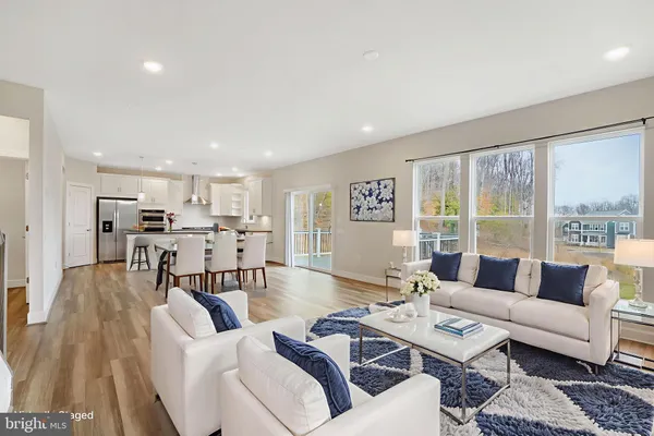 a living room with furniture and a table