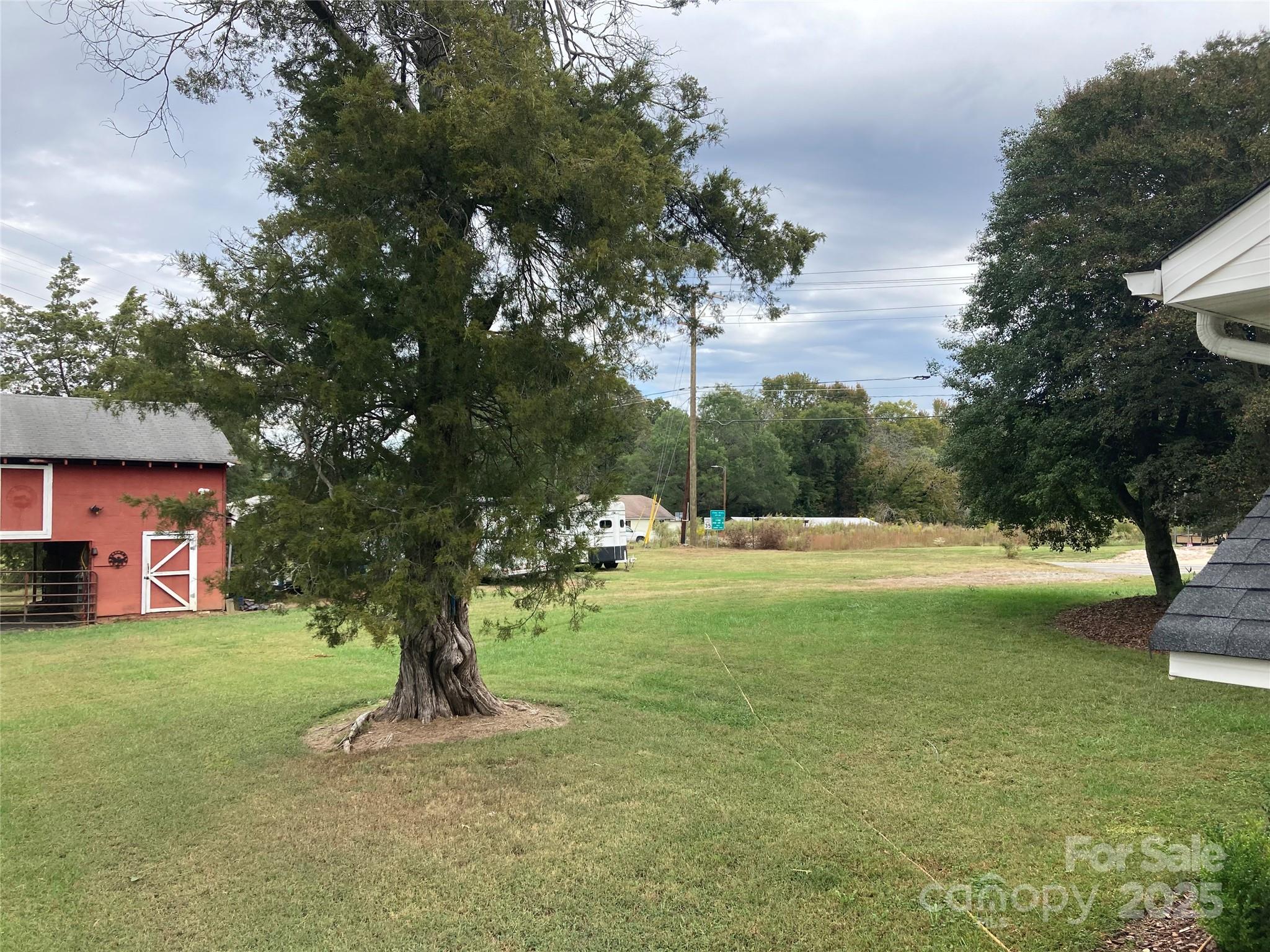 1075 Bostian Road China Grove, NC 28023 - Photo 15 of 25 a view of a house with a yard
