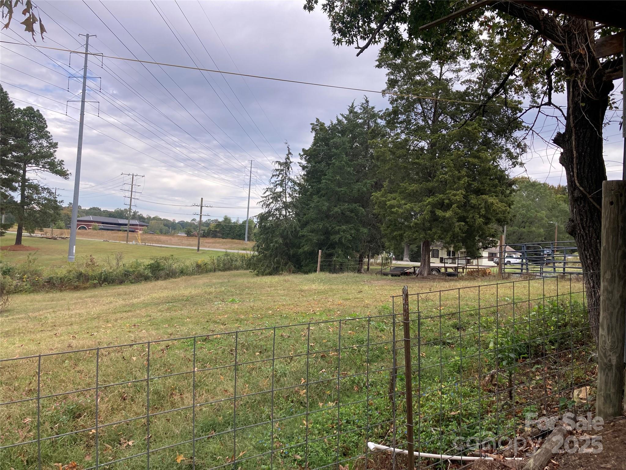 1075 Bostian Road China Grove, NC 28023 - Photo 17 of 25 a view of a big yard next to a house