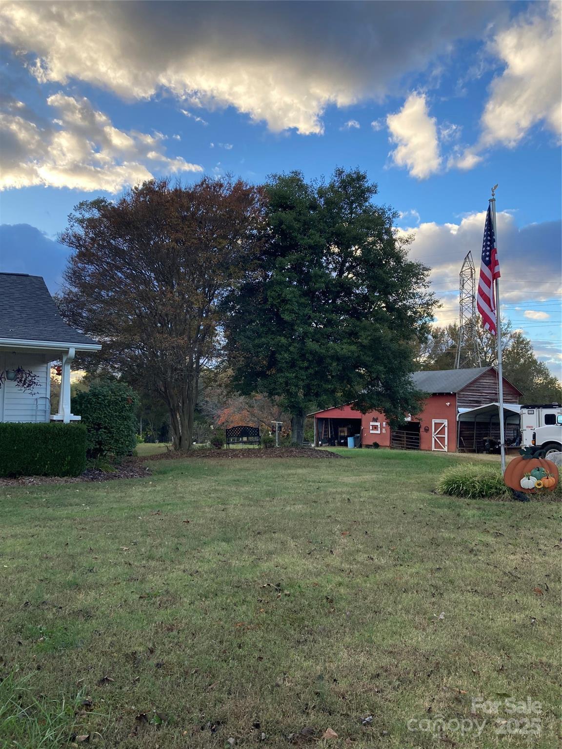 1075 Bostian Road China Grove, NC 28023 - Photo 20 of 25 a front view of a house with a yard and garage