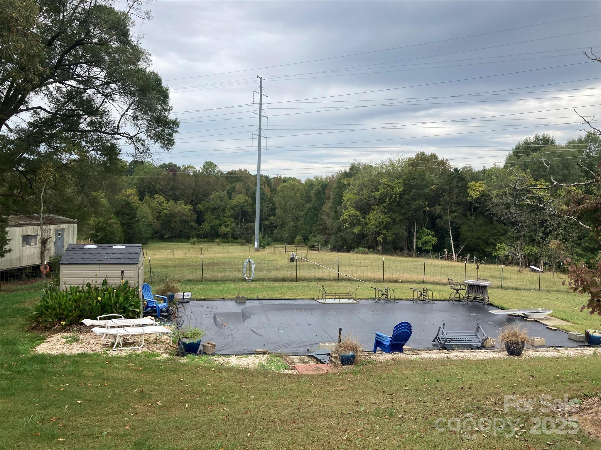 1075 Bostian Road China Grove, NC 28023 - Photo 23 of 25 a view of a swimming pool with a yard and sitting area