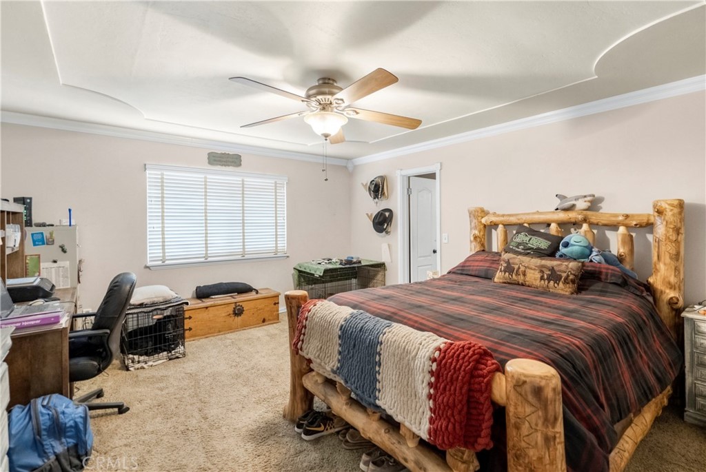 172 Eighth Street Norco, CA 92860 - Photo 21 of 55 a bedroom with a bed and a window