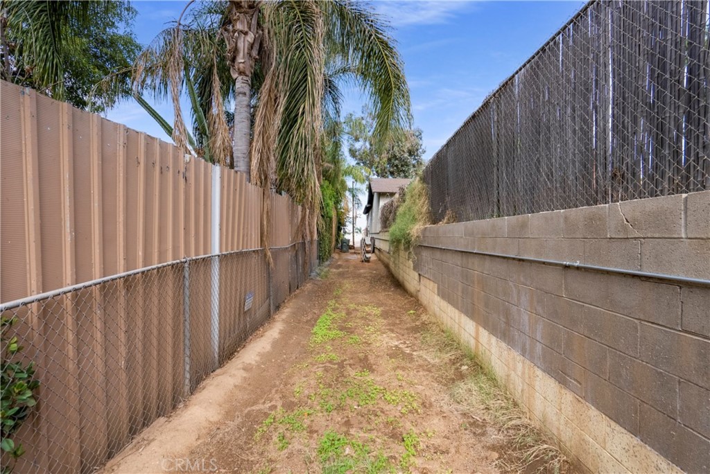 172 Eighth Street Norco, CA 92860 - Photo 37 of 55 a view of a backyard with iron fence