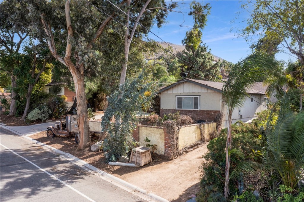 172 Eighth Street Norco, CA 92860 - Photo 40 of 55 a front view of a house with yard