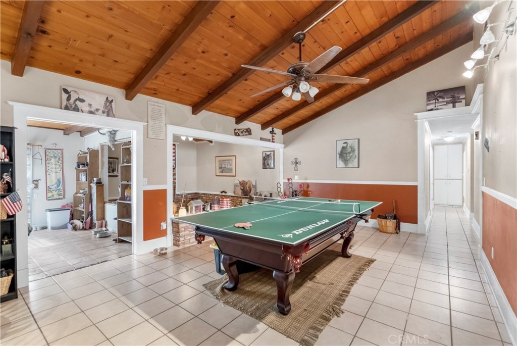 172 Eighth Street Norco, CA 92860 - Photo 6 of 55 a room with pool table and wooden floor