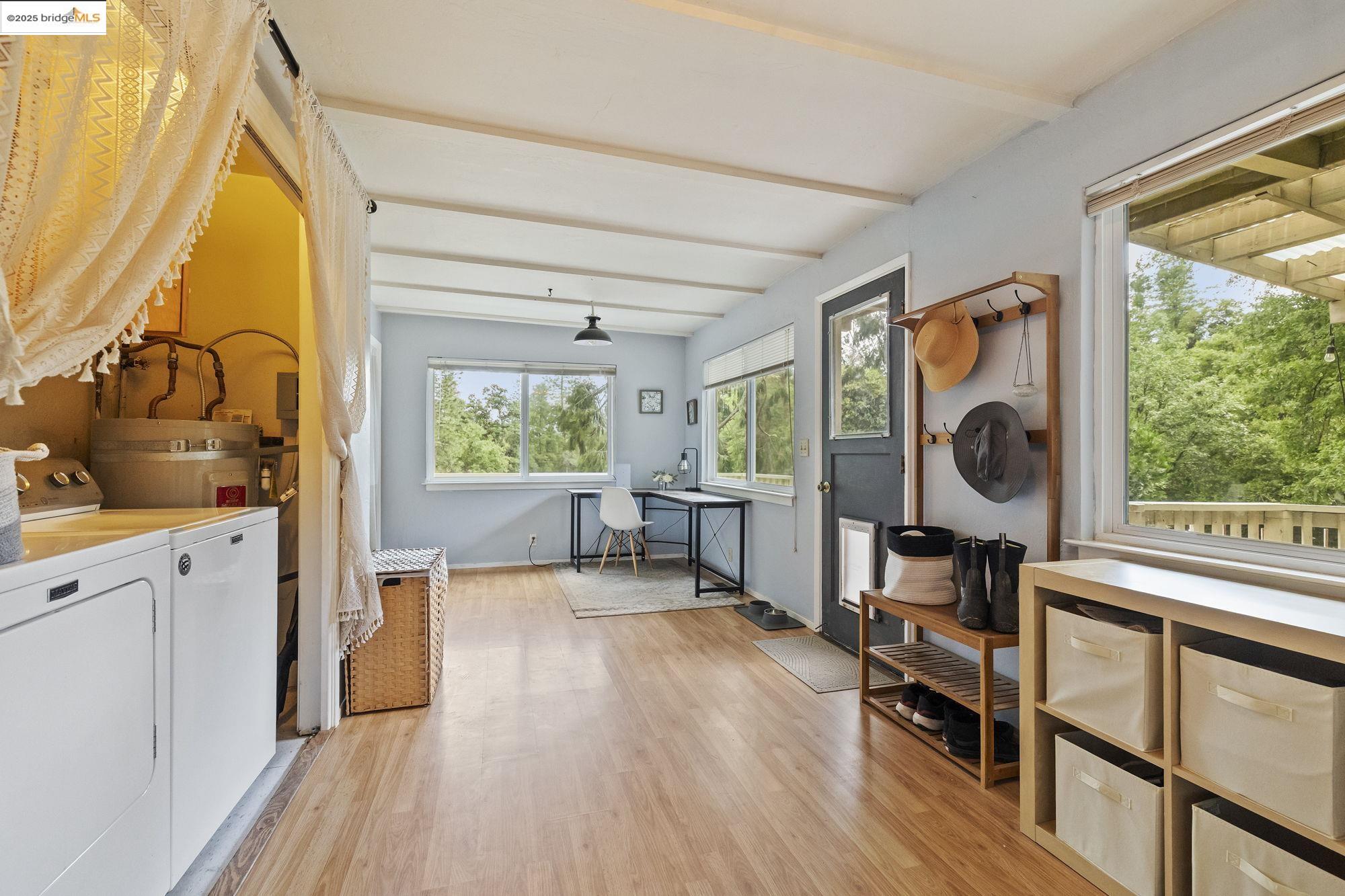 20638 Maranatha Road Tuolumne, CA 95379 - Photo 33 of 60 a view of a bedroom with furniture window and wooden floor
