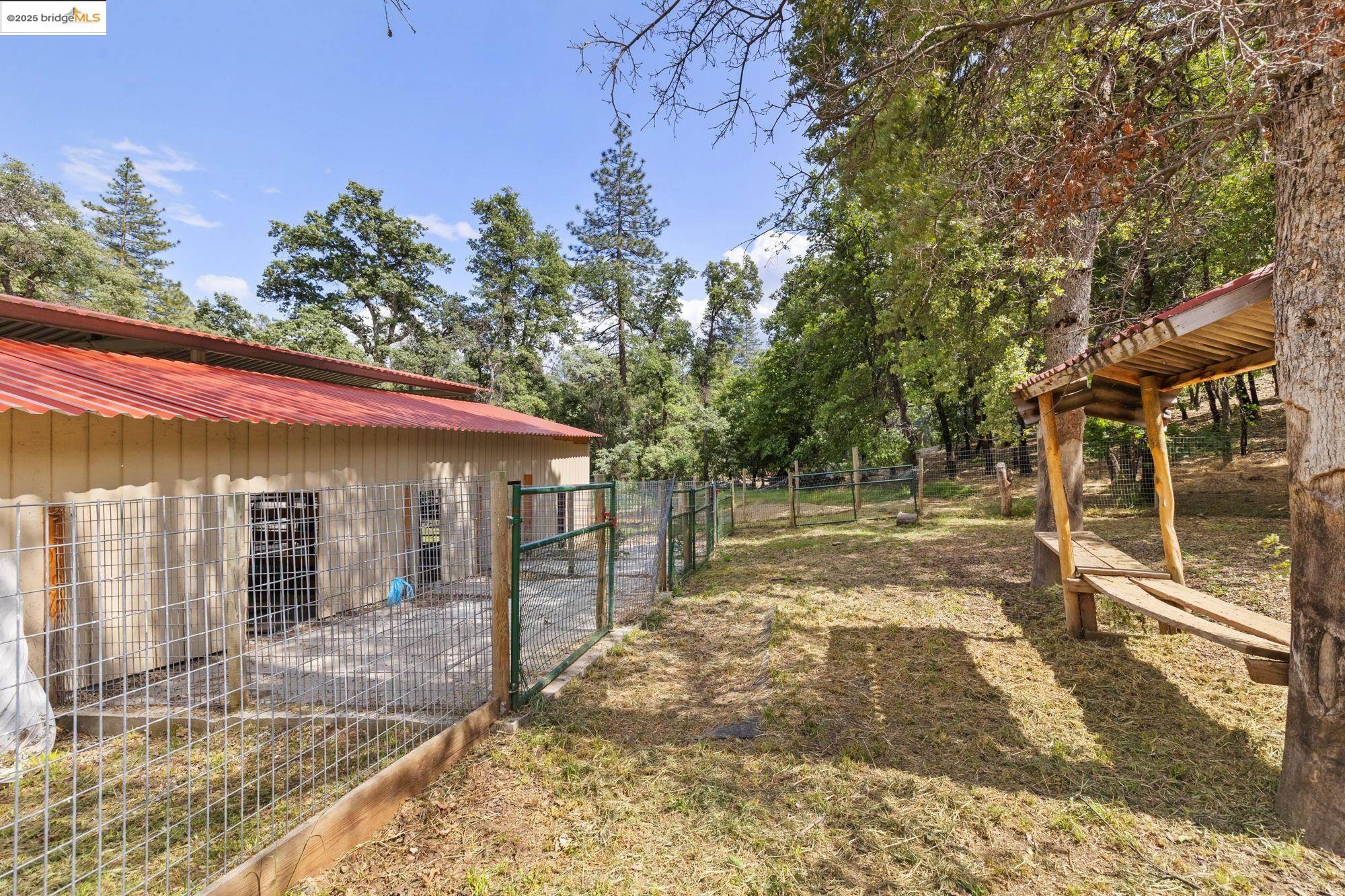 20638 Maranatha Road Tuolumne, CA 95379 - Photo 60 of 60 a view of a house with backyard and sitting area