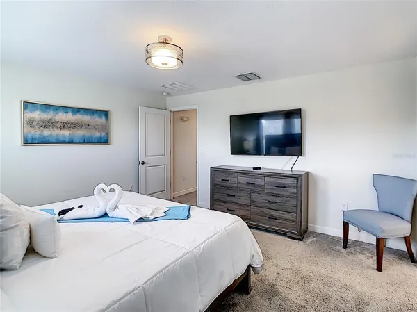 a kitchen with stainless steel appliances a sink stove and refrigerator