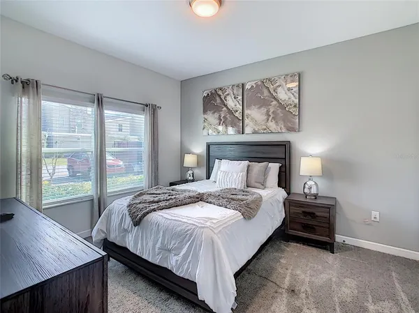 a kitchen with stainless steel appliances granite countertop a sink stove and microwave