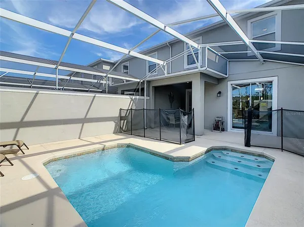 a bedroom with a bed and cabinets