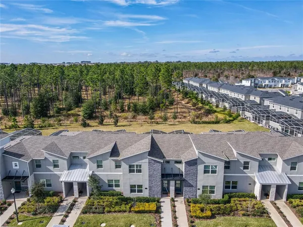 a view of city with ocean