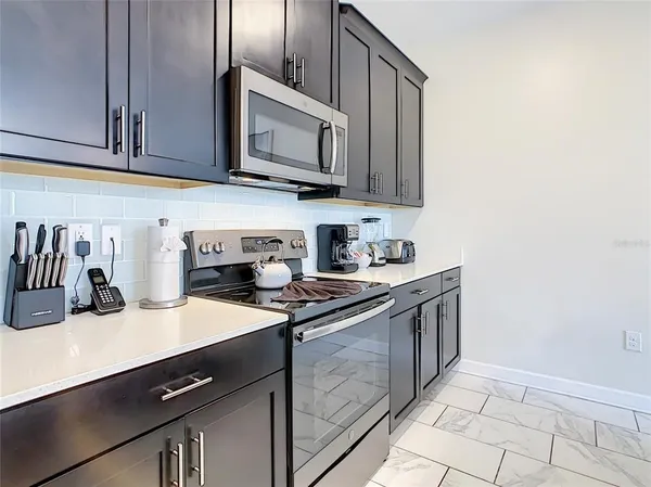 a view of swimming pool from a lounge chair