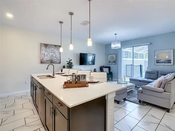 a room with gym equipment and a flat screen tv