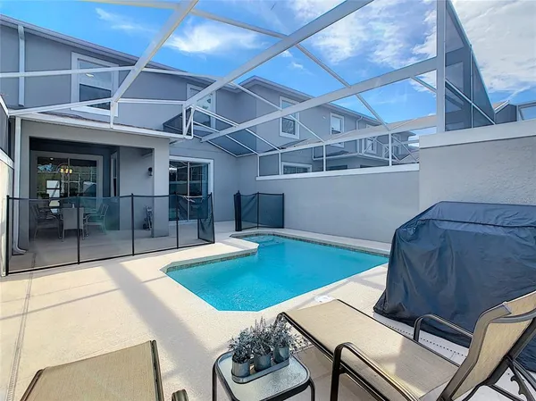 a bathroom with a sink a mirror and vanity