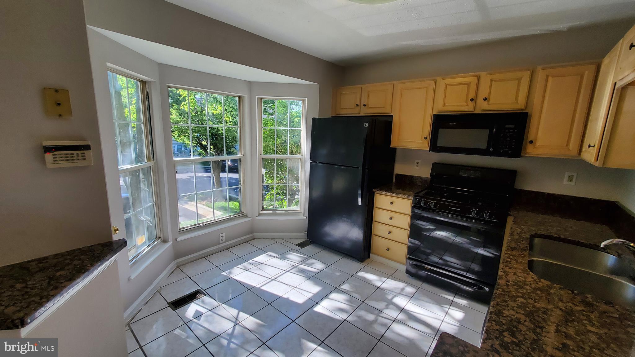 8613 Jacks Reef Road Laurel, MD 20724 - Photo 2 of 17 Bright open kitchen with lots of sunlight