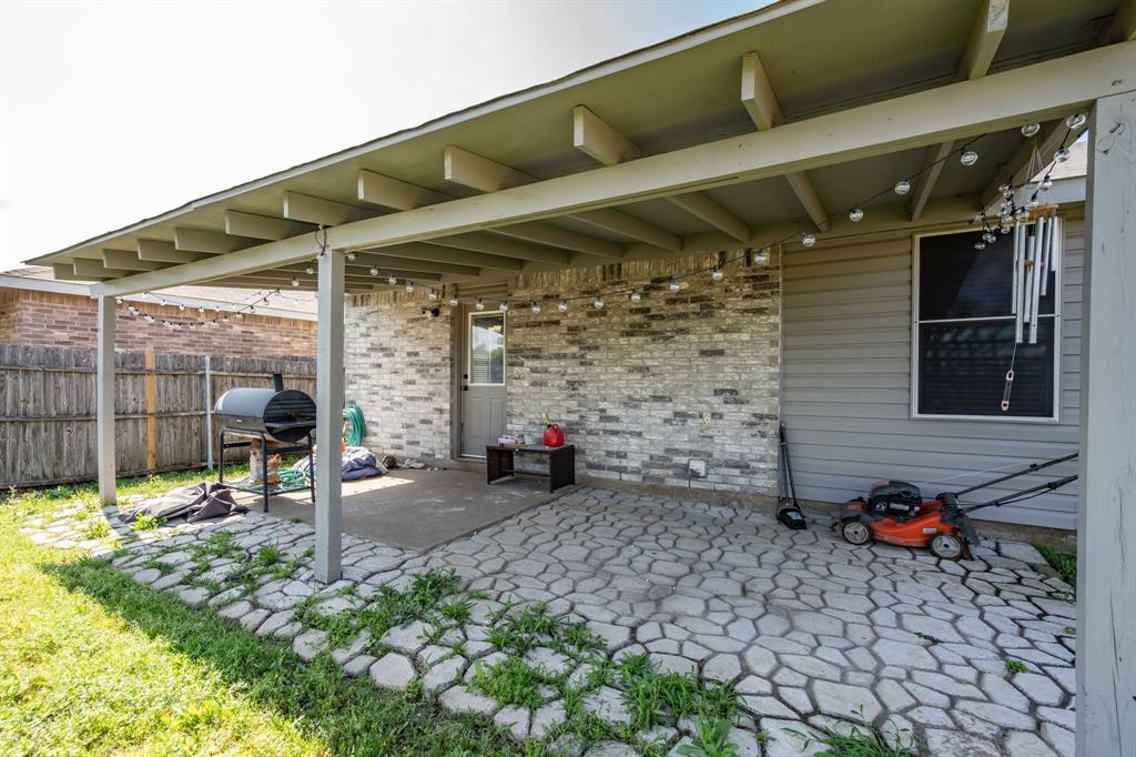 1973 Lariat Drive Fort Worth, TX 76247 - Photo 19 of 28 a view of a car garage