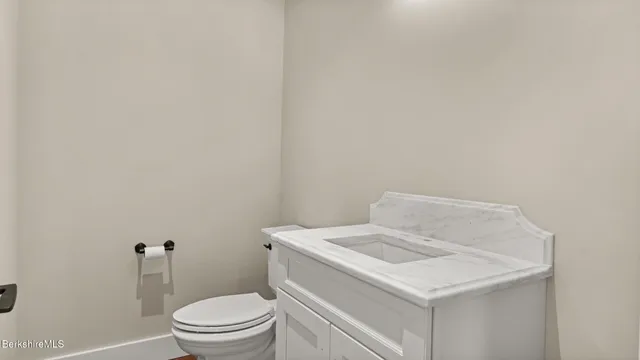a bathroom with a sink and a toilet