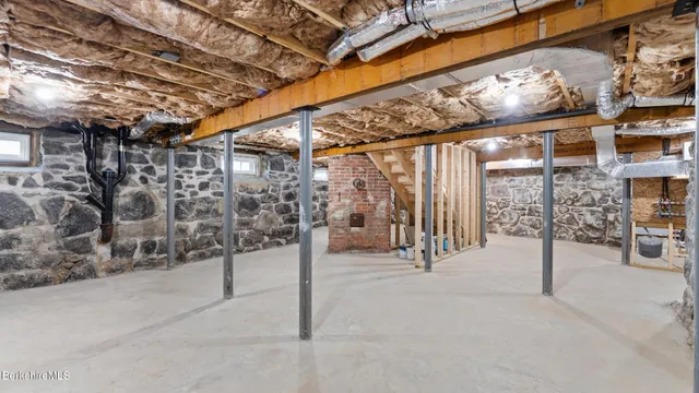 a view of a garage with table and chairs