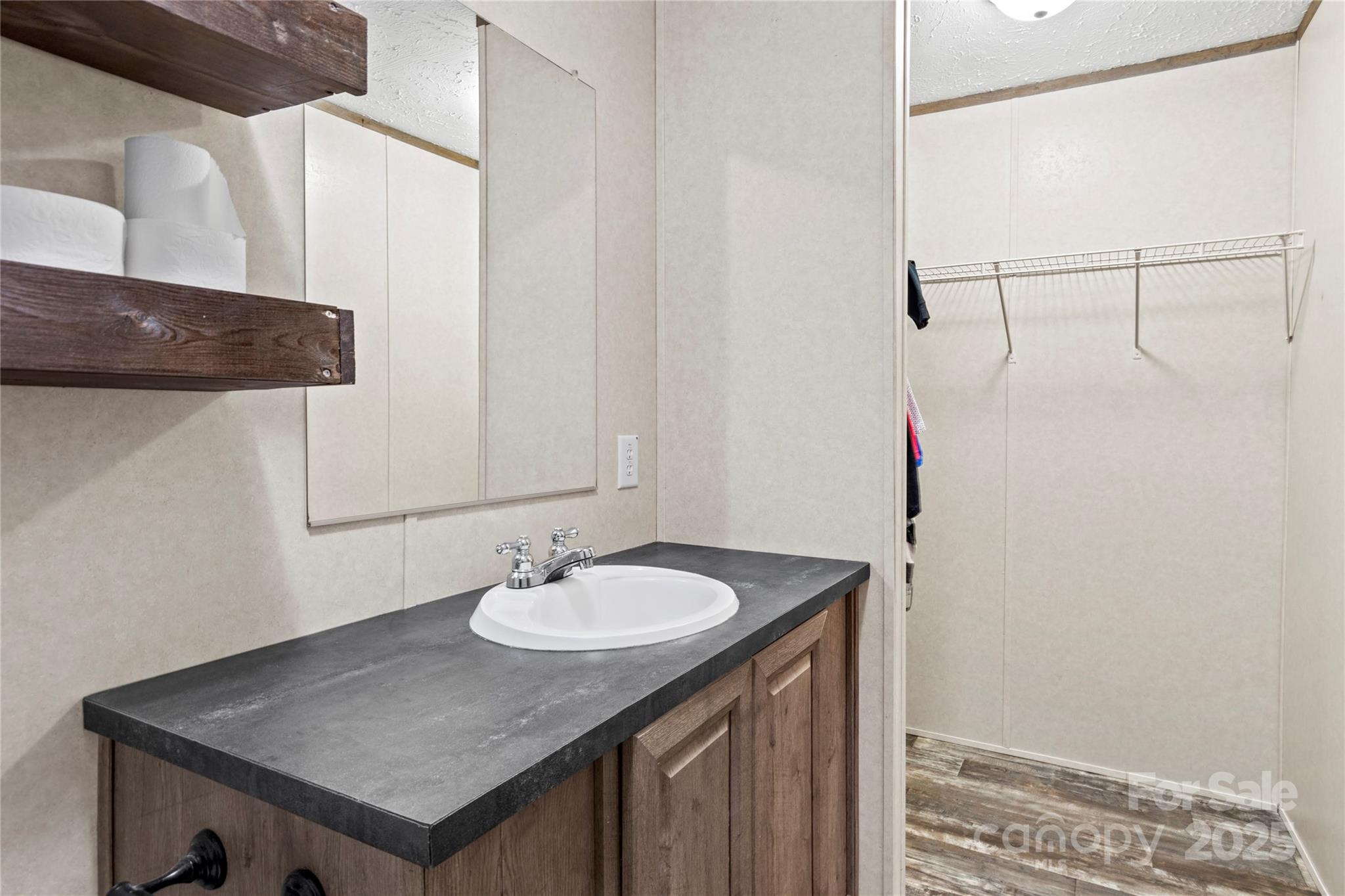 1079 Red Hill Creek Road Dobson, NC 27017 - Photo 16 of 28 a bathroom with a sink and a mirror