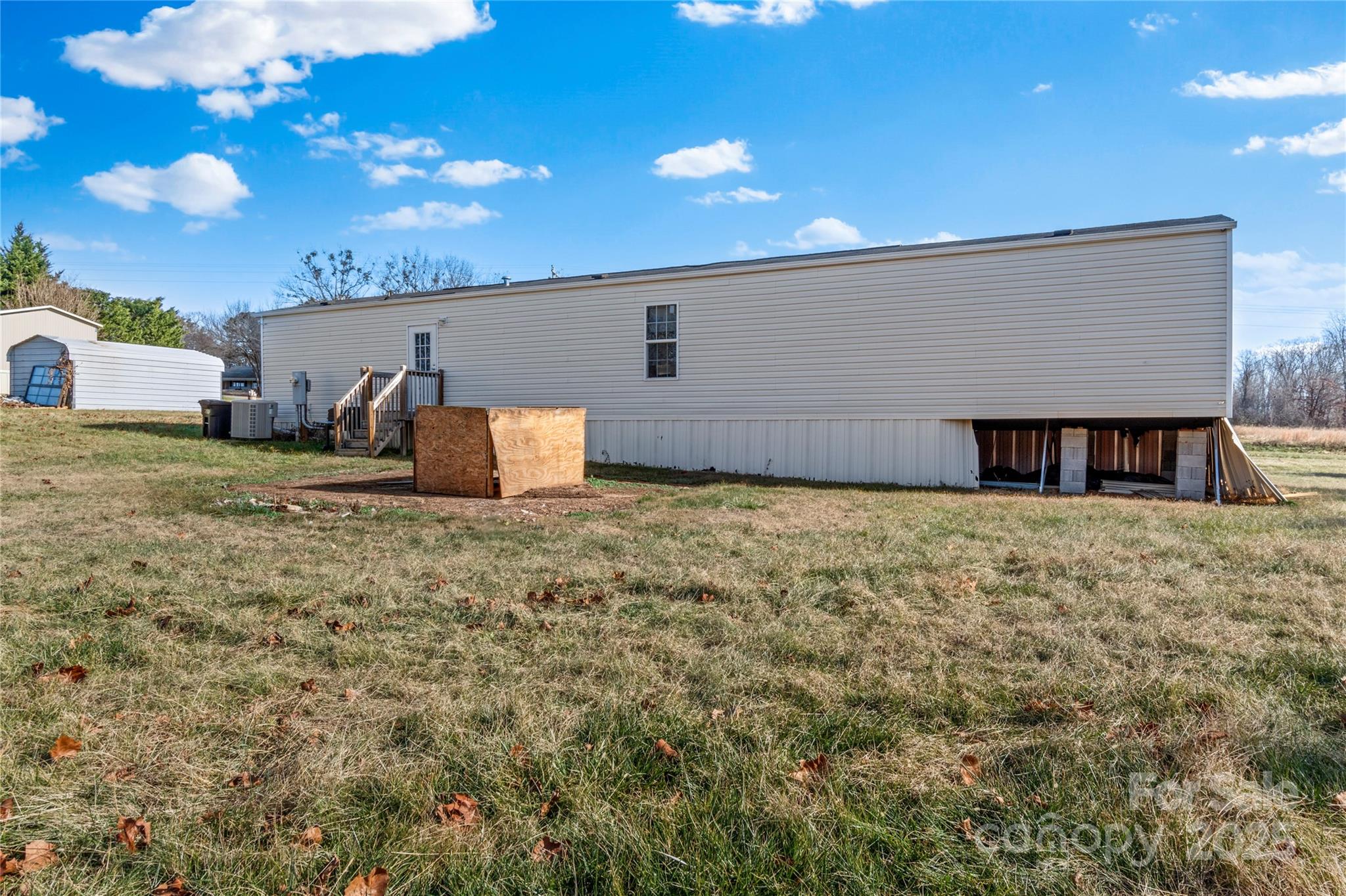 1079 Red Hill Creek Road Dobson, NC 27017 - Photo 26 of 28 a front view of house with yard