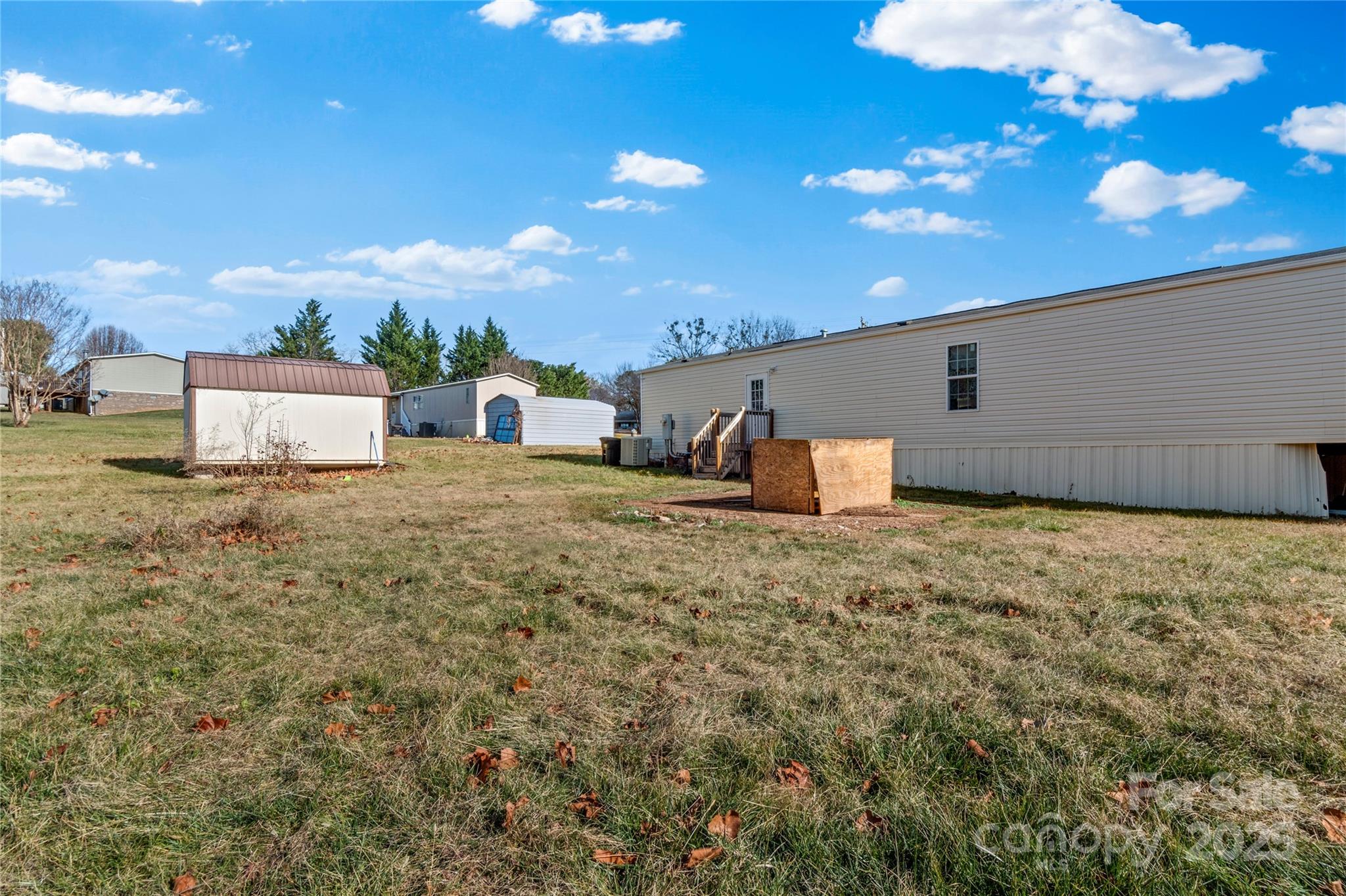 1079 Red Hill Creek Road Dobson, NC 27017 - Photo 27 of 28 a view of a house with a outdoor space