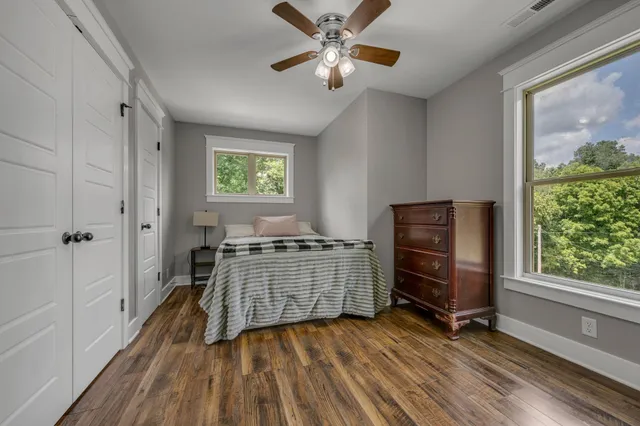 a room with chair and window