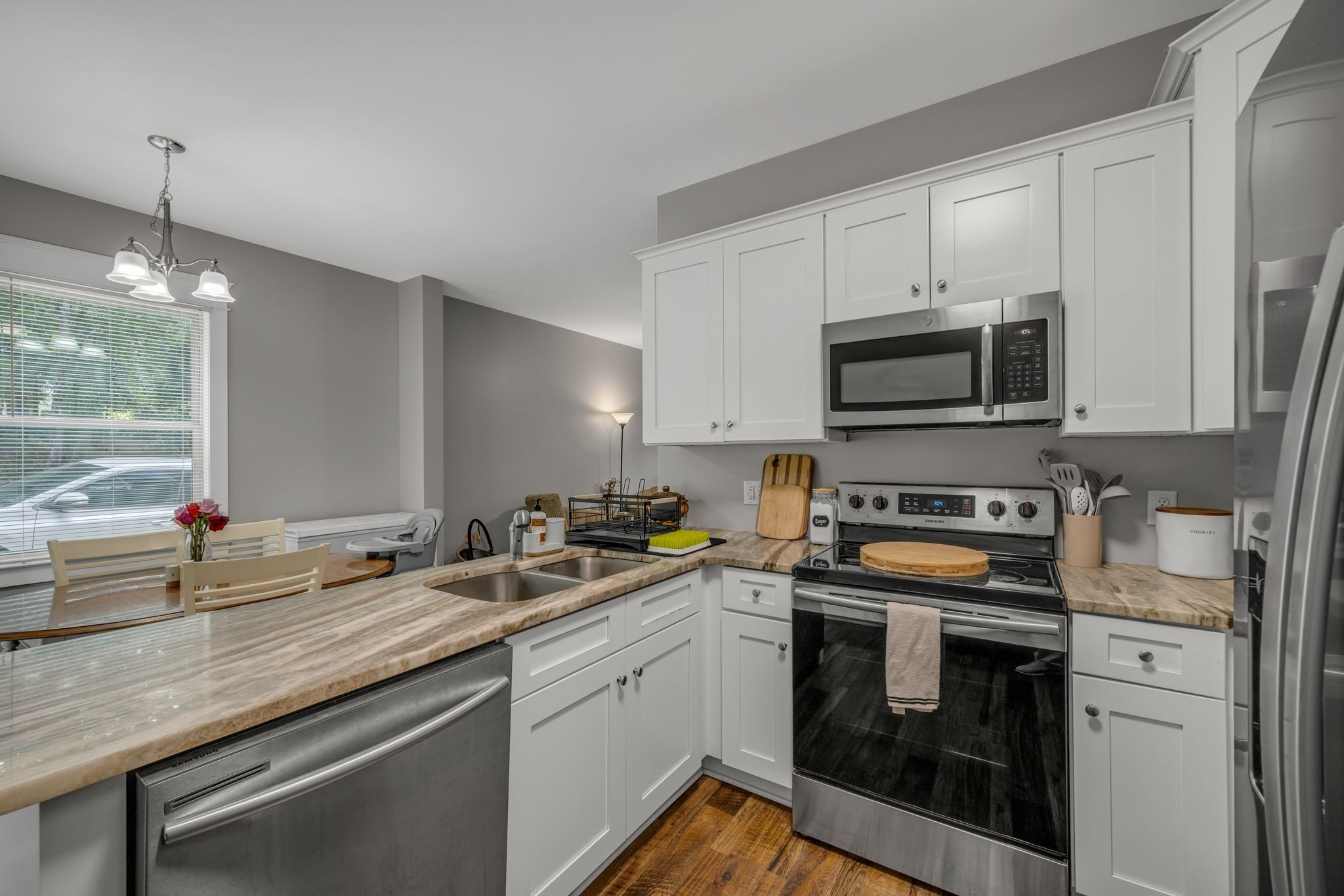 1116 Taylortown Road White Bluff, TN 37187 - Photo 9 of 29 a kitchen with stainless steel appliances white cabinets a sink and a stove