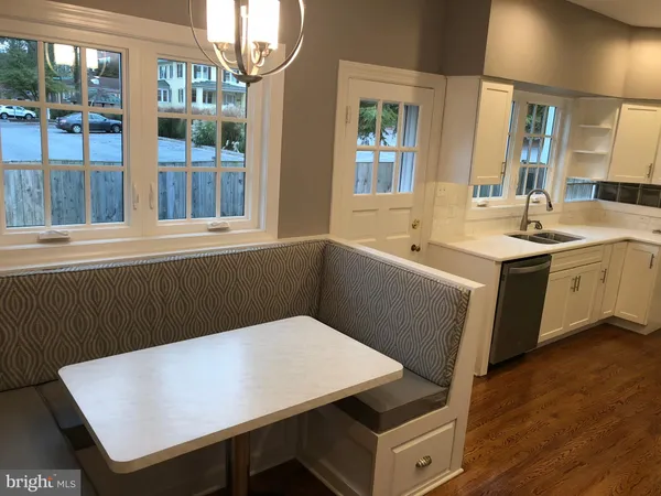 a view of a kitchen area with furniture and window