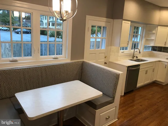 a view of a kitchen area with furniture and window