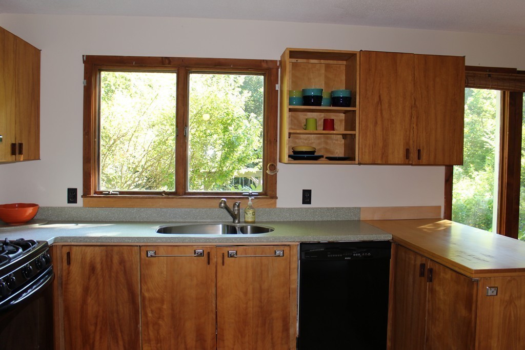 350 March Road Ashfield, MA 01370 - Photo 8 of 30 a kitchen with granite countertop a sink and a window